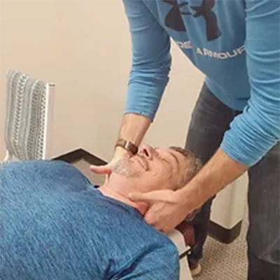 Chiropractic Cary NC Man Receiving Adjustment