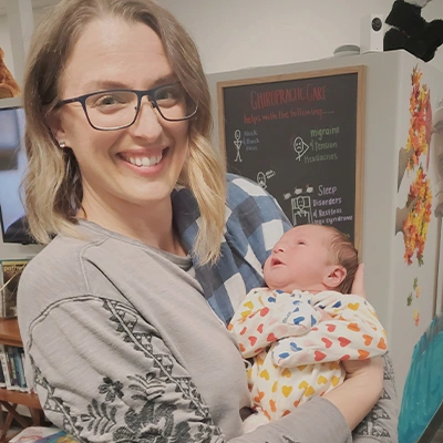 Chiropractor Cary NC Jaylene Bair Holding Baby